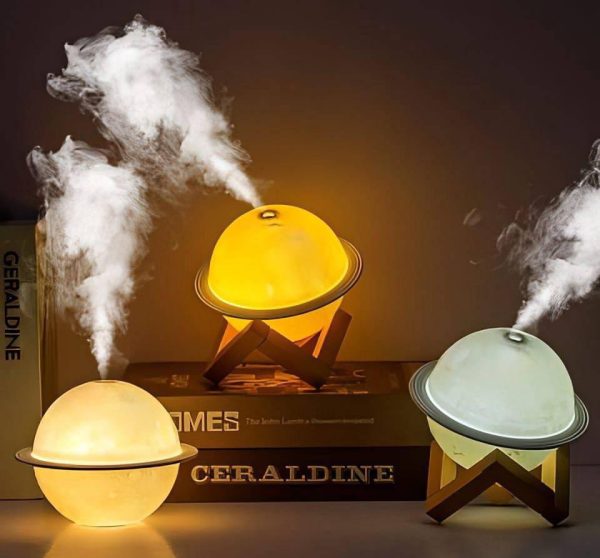 Cool Mist Aroma Diffuser SX-E323 Planet Humidifier In White Color, Premium Quality Material: ABS Plastic Model: SX-E323 Product Features: Planet Shape, Continues Spray For About 4 Hours Water Tank Capacity: 200Ml Spray Volume: 30-50ML/H Charge: Usb 2.0 Power: 2W+0.5W Nominal Voltage: 5V(500MA) Package Includes: 1 x Air Purifier Note: Please ensure to follow the instructions provided in the user manual for proper usage and safety precautions.